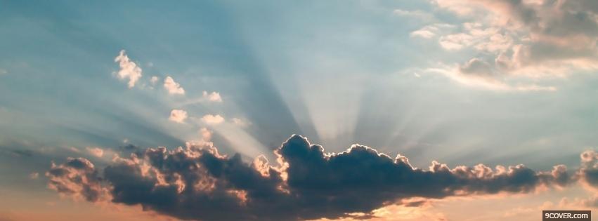 Photo sun beaming out of cloud Facebook Cover for Free
