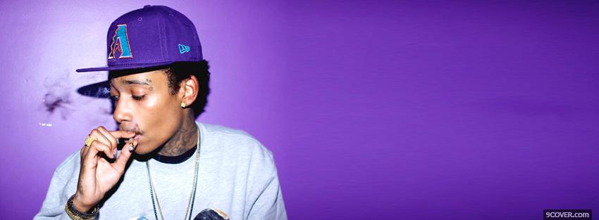 Photo wiz khalifa with purple cap Facebook Cover for Free